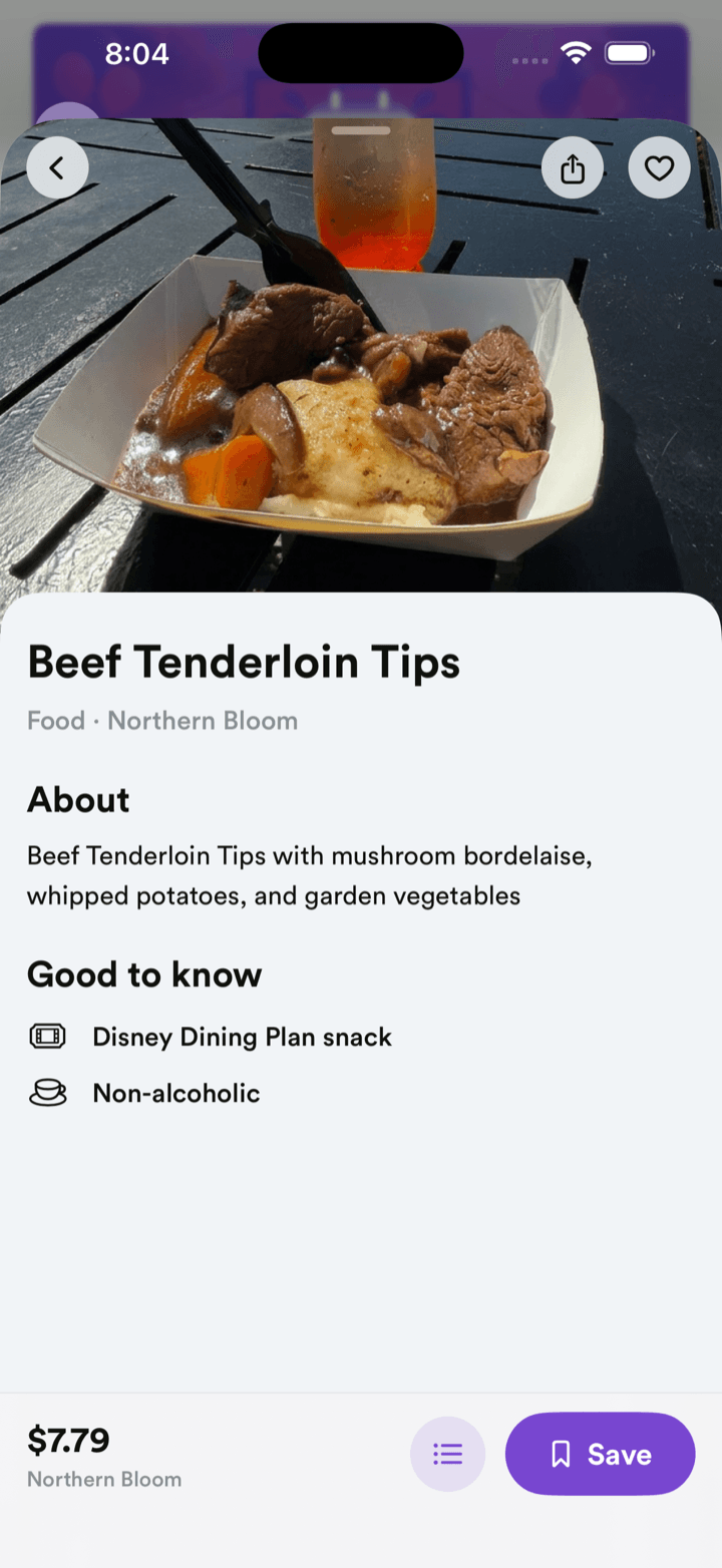 A dish detail screen in WDW Planner with a photo, description, price, and dietary notes